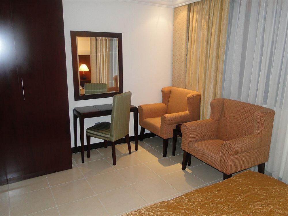 Ewan Ajman Suites Hotel Chambre photo