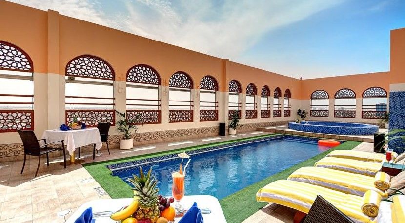Ewan Ajman Suites Hotel Extérieur photo